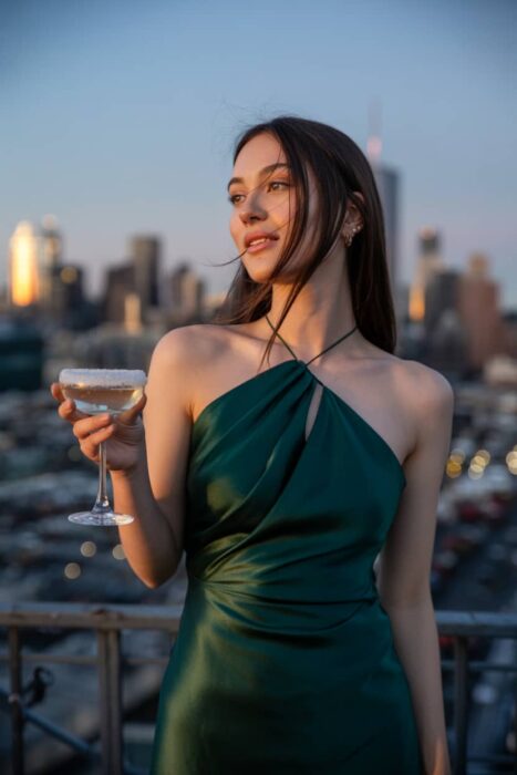 rooftop 21st birthday photoshoot with city views and cocktail glass