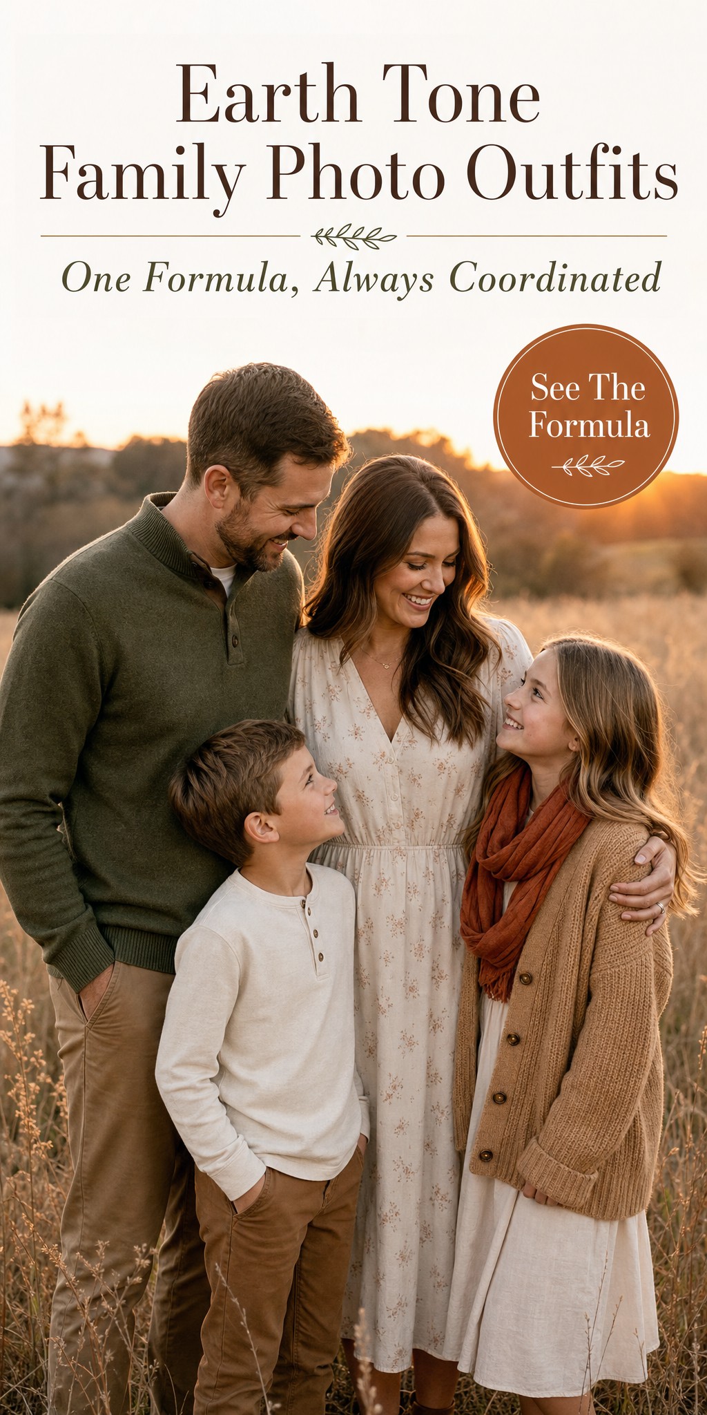 Family of four in coordinated olive, cream, and rust earth tone outfits in a golden field at sunset
